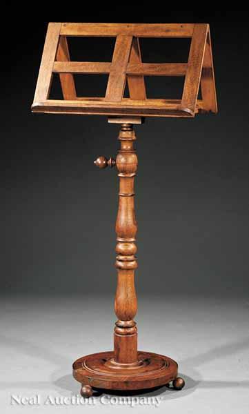 Appraisal: An English Pine Revolving Duet Music Stand mid- th c