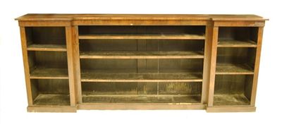 Appraisal: A th century rosewood inverted breakfront bookcase with adjustable shelves