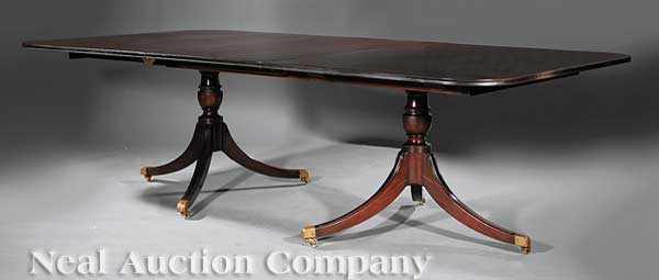 Appraisal: An Antique Georgian-Style Carved Mahogany Two Pedestal Dining Table th