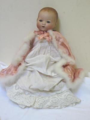 Appraisal: An Armand Marseille bisque head baby doll with blue glass