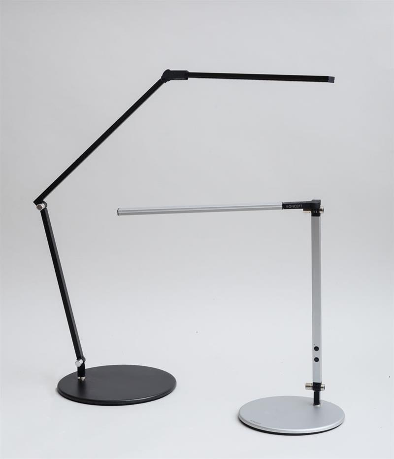 Appraisal: TWO KONCEPT TABLE LAMPS Painted metal and plastic x in