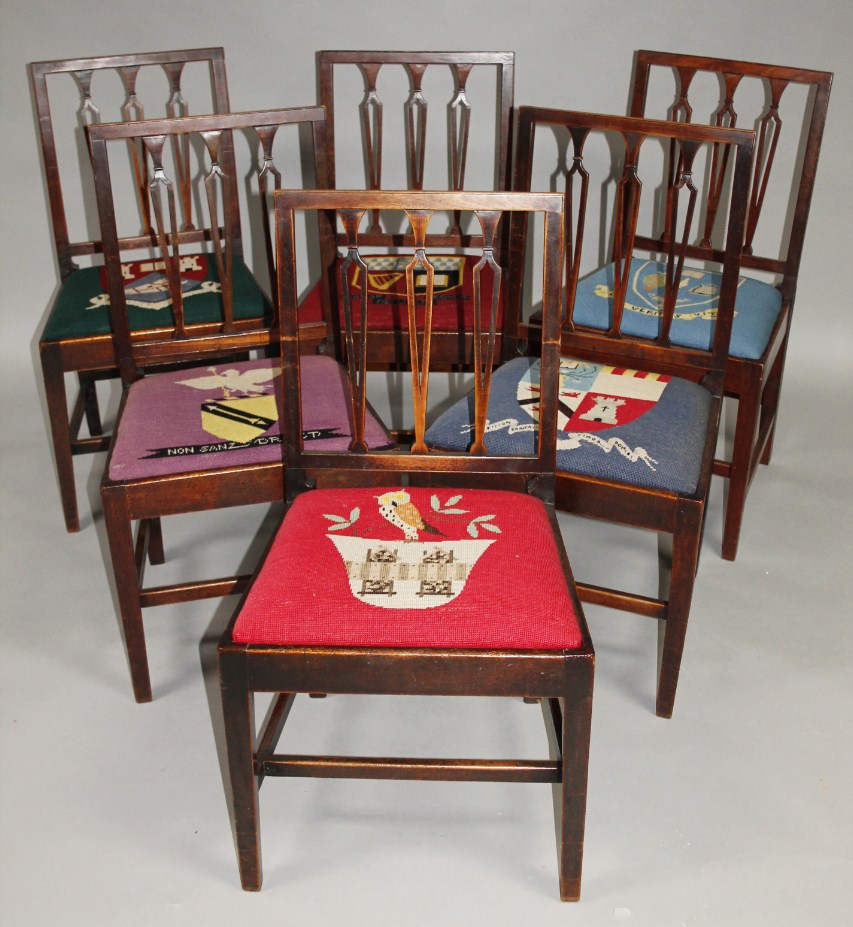 Appraisal: A set of six Country Chippendale fruit wood dining chairs