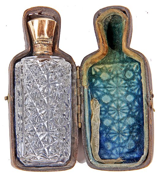 Appraisal: CUT GLASS TRAVELING PERFUME BOTTLE A MID TH CENTURY CUT