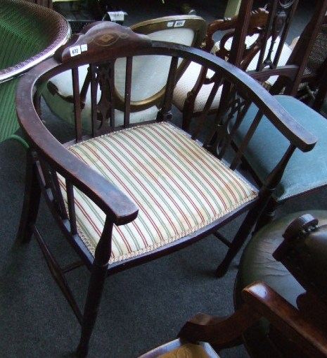 Appraisal: A late th century inlaid mahogany tub chair with triple