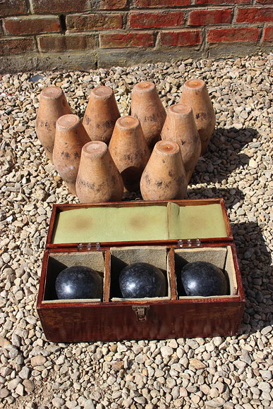 Appraisal: A GROUP OF NINE TURNED BEECHWOOD SKITTLES cm high and