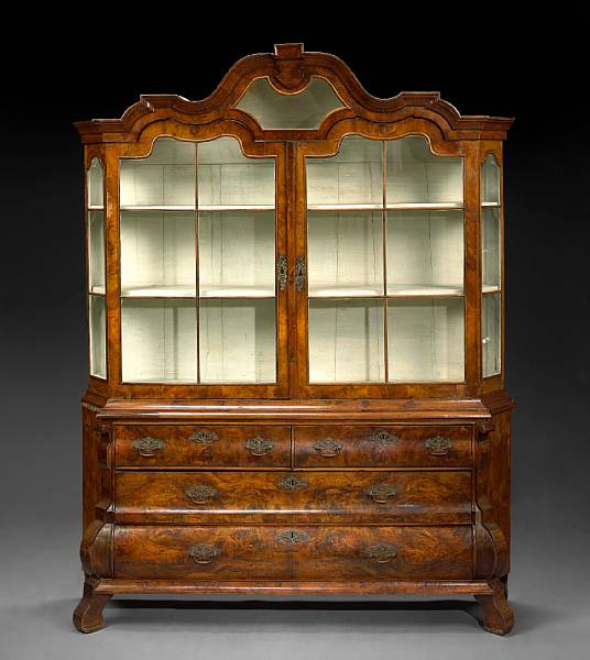 Appraisal: A Dutch Rococo walnut display cabinet late th early th