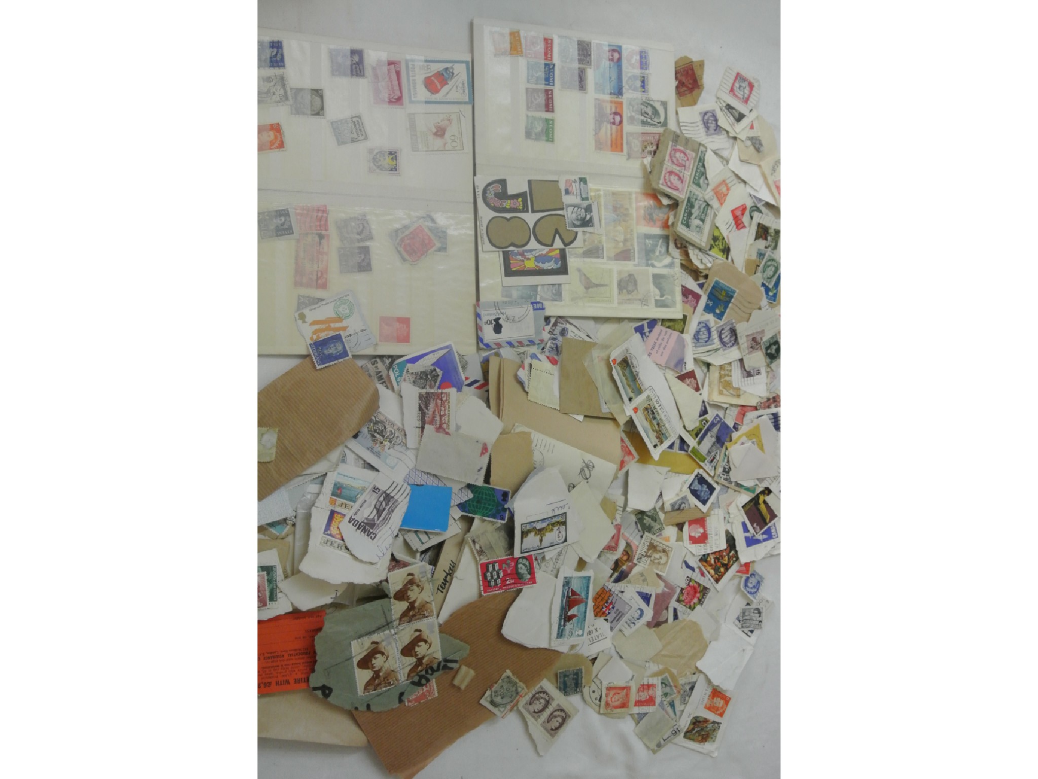 Appraisal: A carrier bag containing a large quantity of unsorted stamps