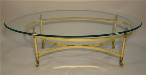 Appraisal: MODERN BRASS AND GLASS TOP COFFEE TABLE the oval glass