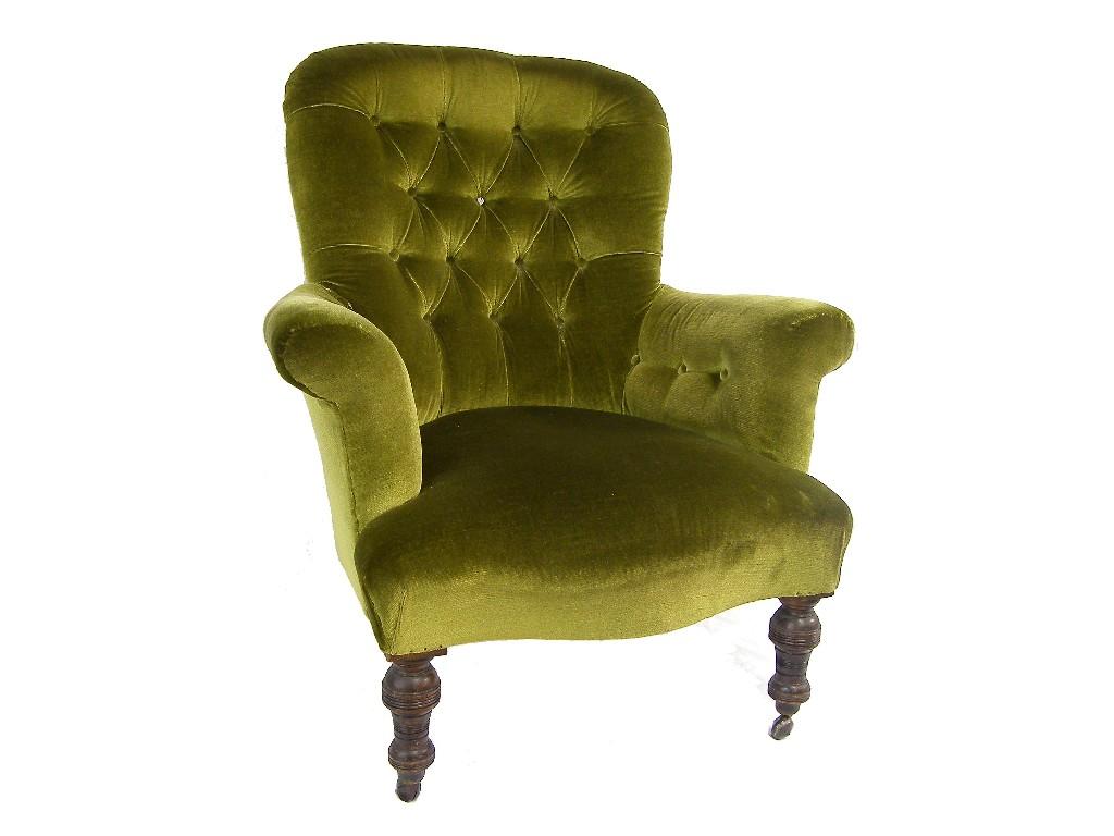 Appraisal: Victorian green button-back upholstered armchair with a serpentine seat upon