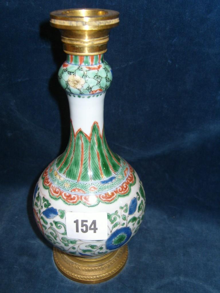 Appraisal: A th century oriental vase with painted Famille Verte trailing