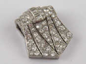 Appraisal: An Art Deco French hallmarked platinum round brilliant and baguette