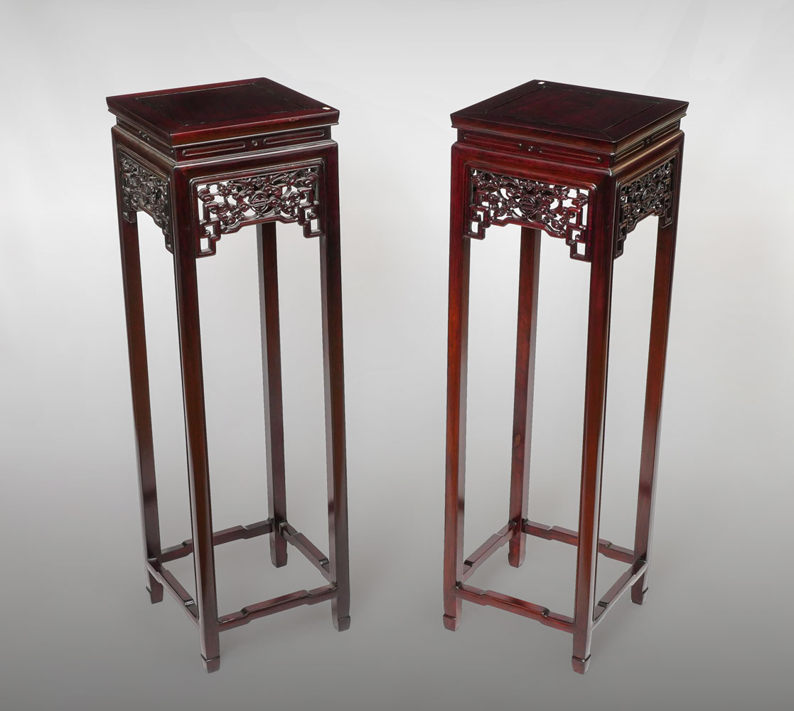 Appraisal: PAIR OF LARGE CARVED CHINESE PLANT STANDS Chinese Carved Rosewood