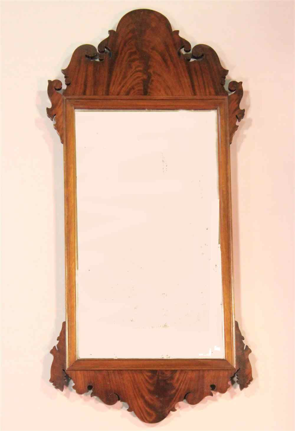 Appraisal: CHIPPENDALE STYLE MAHOGANY MIRROR the rectangular mirror plate enclosed by