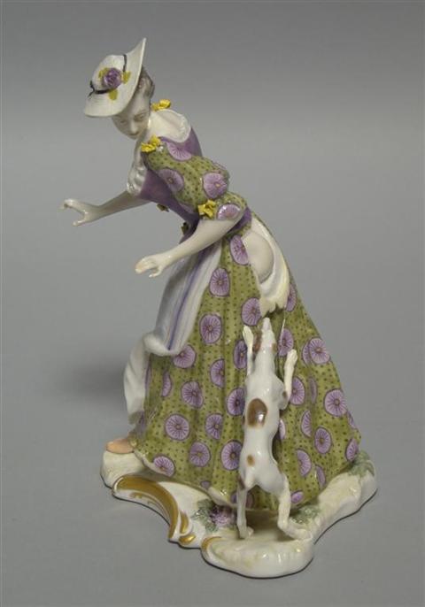 Appraisal: NYMPHENBURG GROUP OF A LADY AND A DOG Impressed shield