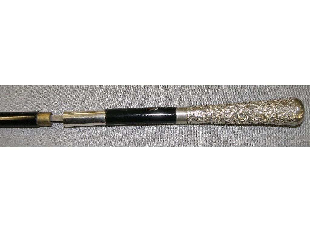 Appraisal: Ebonised sword stick with an embossed foliate Indian white metal