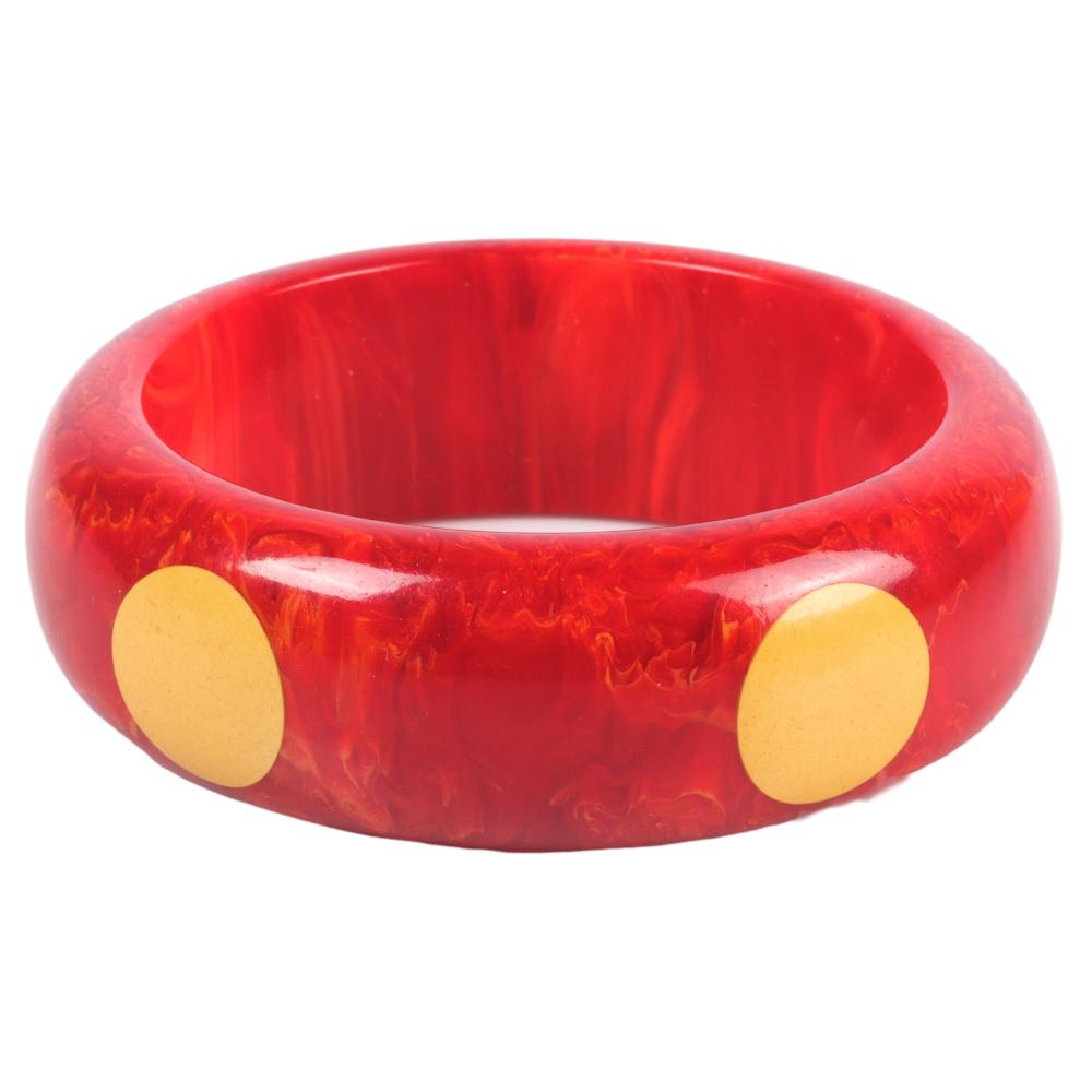 Appraisal: POLKA DOT BAKELITE MARBLED RED AND CREAM BANGLE BRACELET W