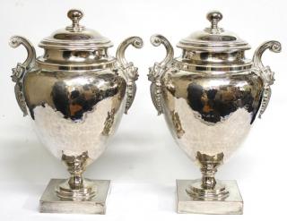 Appraisal: Pair of Large Silvered Metal Covered Urns Of ancient amphora-form