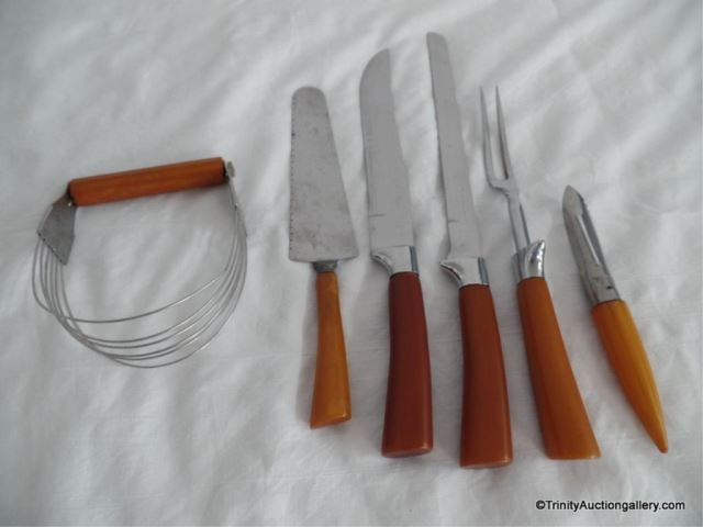 Appraisal: Vintage Kitchenware Butterscotch Bakelite Handles Six pieces of kitchen utensils