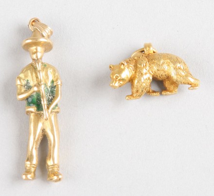 Appraisal: Grizzly bear pendant KY grams Figure pendant KY tall man