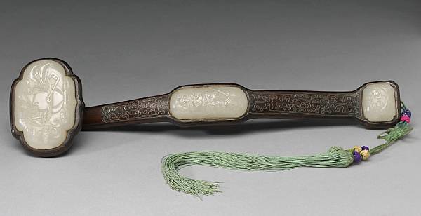 Appraisal: A white jade-mounted wood ruyi scepter th Century The three