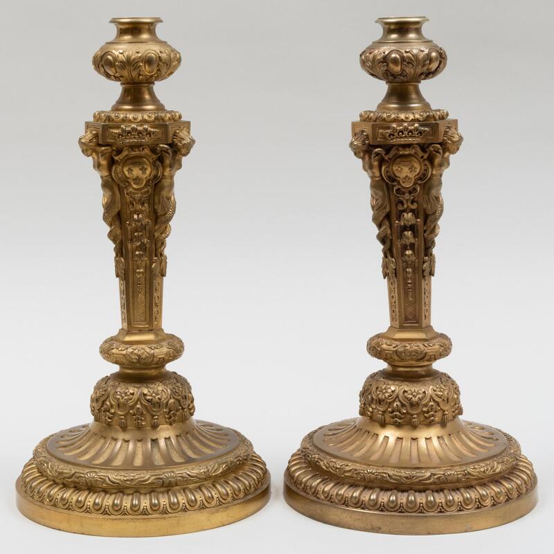 Appraisal: Large Pair of R gence Style Gilt-Bronze Candlesticks Both cast