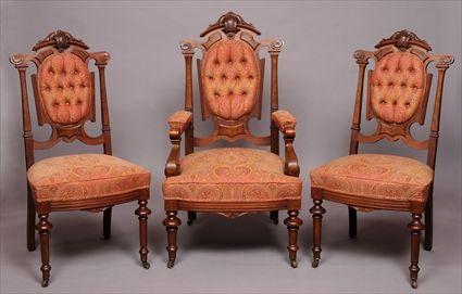 Appraisal: AMERICAN RENAISSANCE REVIVAL INCISED WALNUT AND FIGURED WALNUT FOUR-PIECE PARLOR