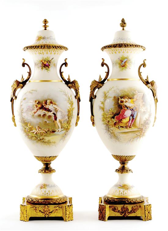 Appraisal: Pair ormolu-mounted Sevres style porcelain urns late th century domed