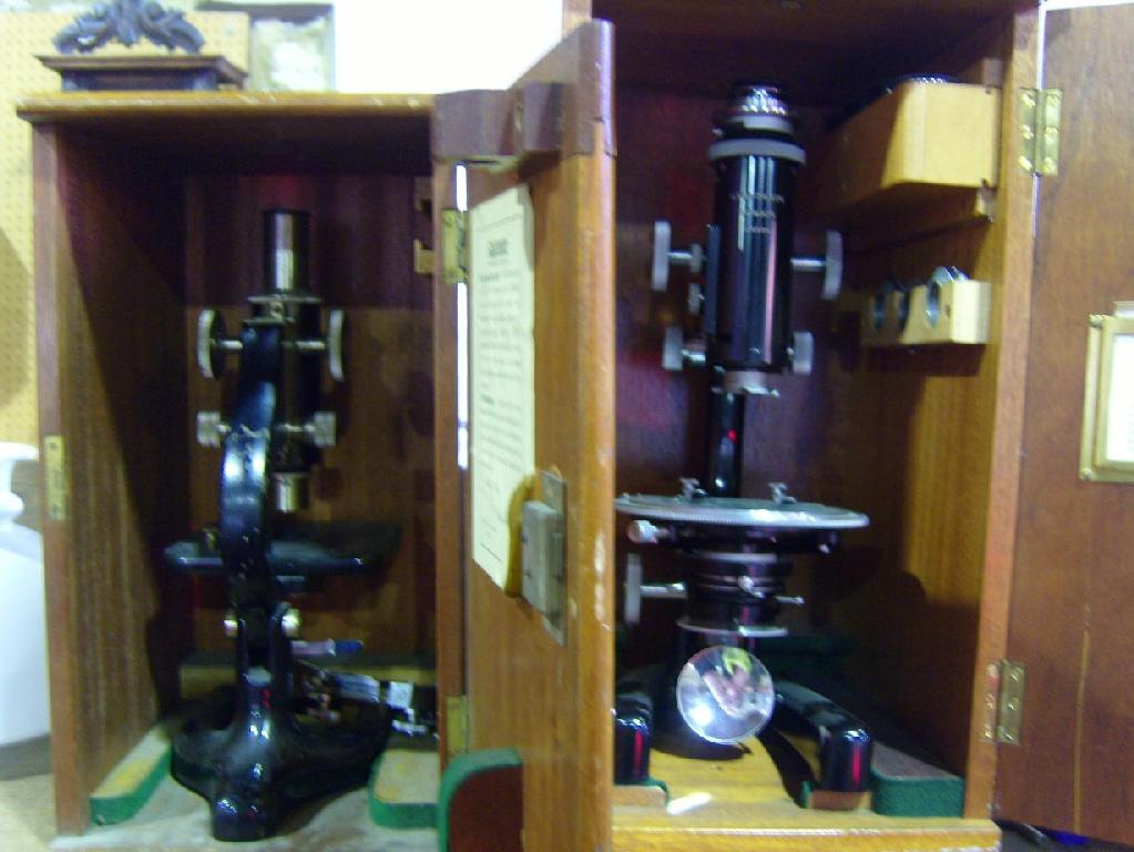 Appraisal: Two cased microscopes one by J Swift Son marked number