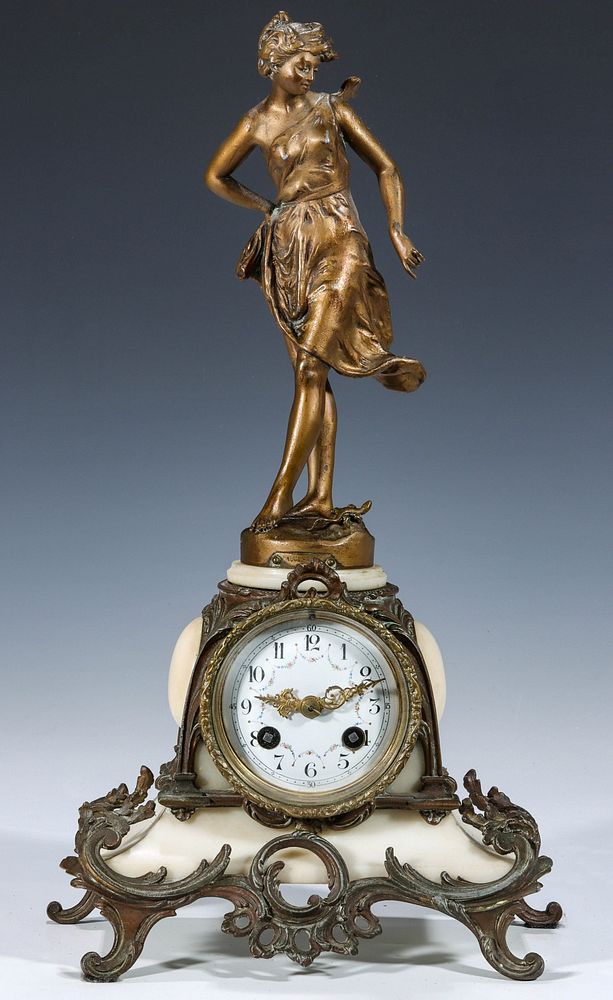 Appraisal: A FRENCH STATUE CLOCK WITH MOVEMENT SIGNED MARTI The spelter