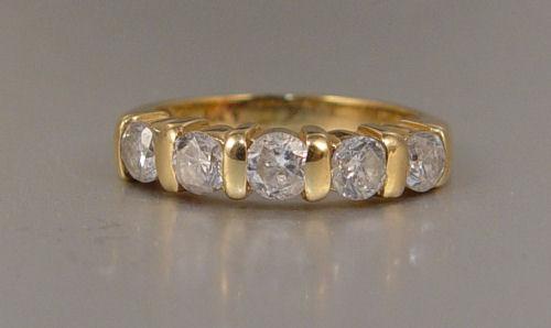 Appraisal: Ct DIAMOND ANNIVERSARY BAND K yellow gold ring of round