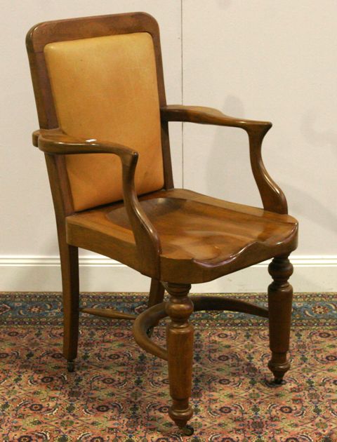 Appraisal: An Australian pine elbow chair