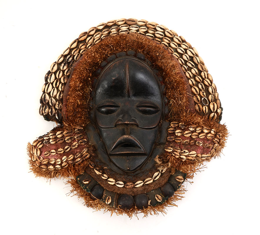 Appraisal: DAN TRIBE COWRIE SHELL AFRICAN MASK Carved wood mask decorated