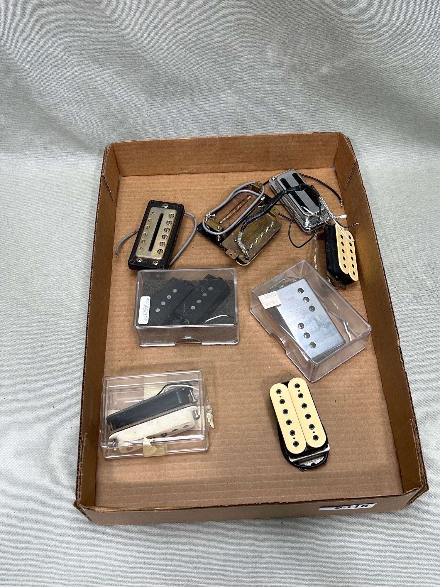 Appraisal: Lot of vintage guitar pickupsLot of vintage guitar pickups All