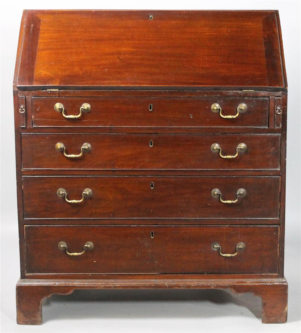 Appraisal: GEORGE III MAHOGANY SLANT FRONT DESK having a slant front