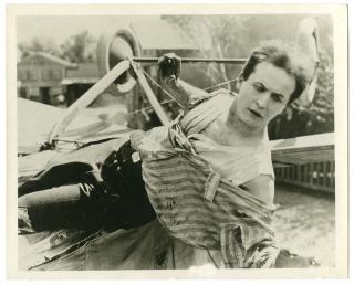 Appraisal: Houdini Harry Movie Still of Houdini Hanging from Airplane in