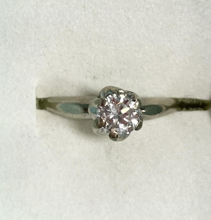 Appraisal: k white gold diamond solitaire ring marked k and Bau