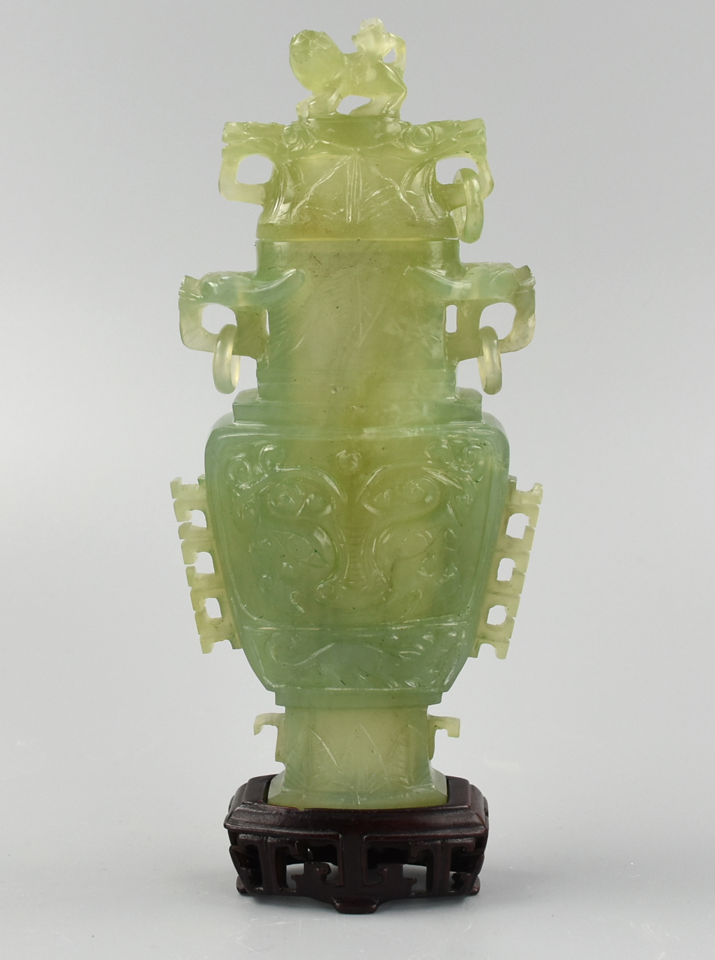 Appraisal: CHINESE JADEITE ARCHAISTIC JAR COVER W STAND A small archaistic