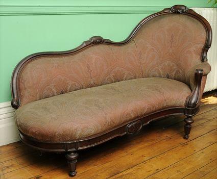 Appraisal: ENGLISH ROCOCO REVIVAL CARVED WALNUT CHAISE LOUNGE The shaped asymmetrical