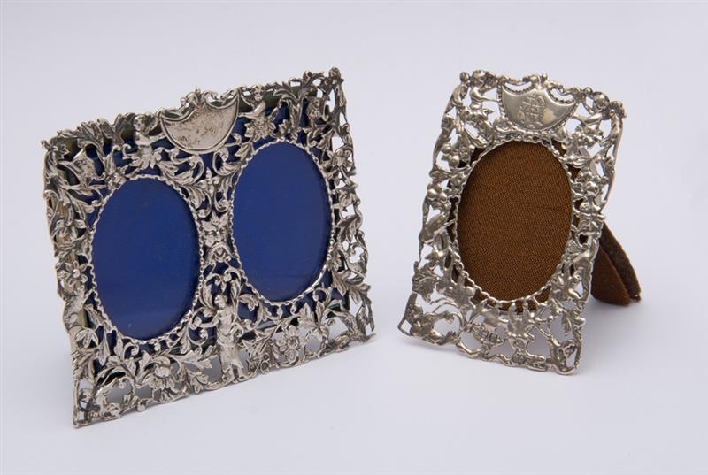 Appraisal: TWO ENGLISH SILVER FILIGREE SMALL PICTURE FRAMES William Comyus London