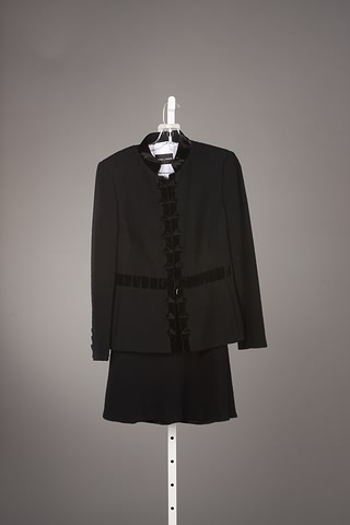 Appraisal: Rena Lange -piece black skirt suit with velvet trim and