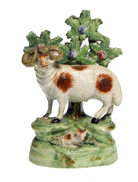 Appraisal: A STAFFORDSHIRE PEARLWARE SHEEP AND LAMB GROUP POSSIBLY WALTON the