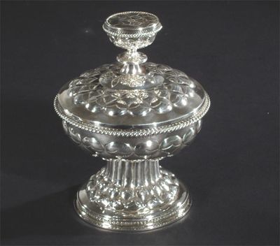 Appraisal: An A E Jones silver cup and cover after the