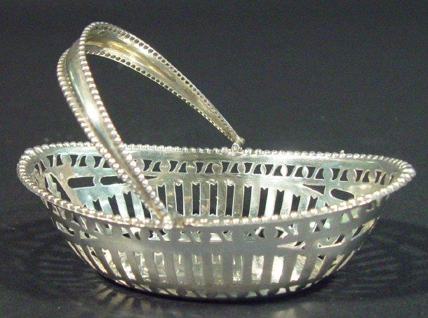 Appraisal: Silver basket shaped bonbon dish with pierced decoration Birmingham cm