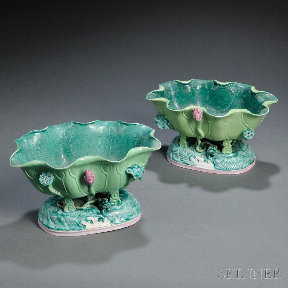 Appraisal: Pair of Porcelain Lotus-shaped Bowls China decorated with applied lotus