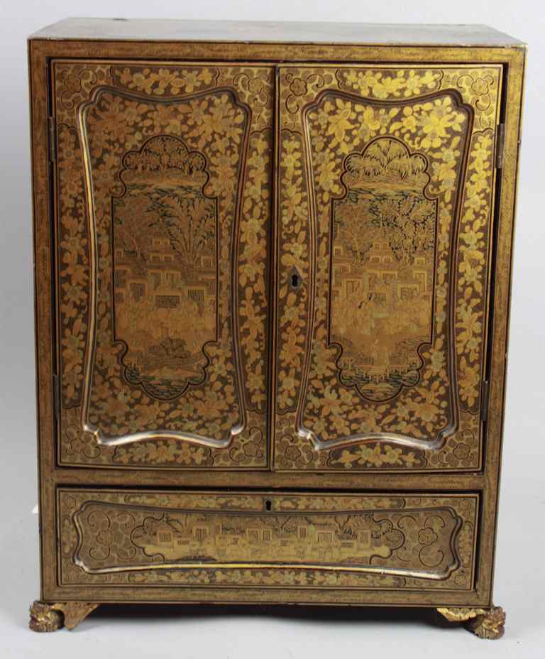 Appraisal: CHINESE EXPORT GILT DECORATED BLACK LACQUER CABINET The hinged doors