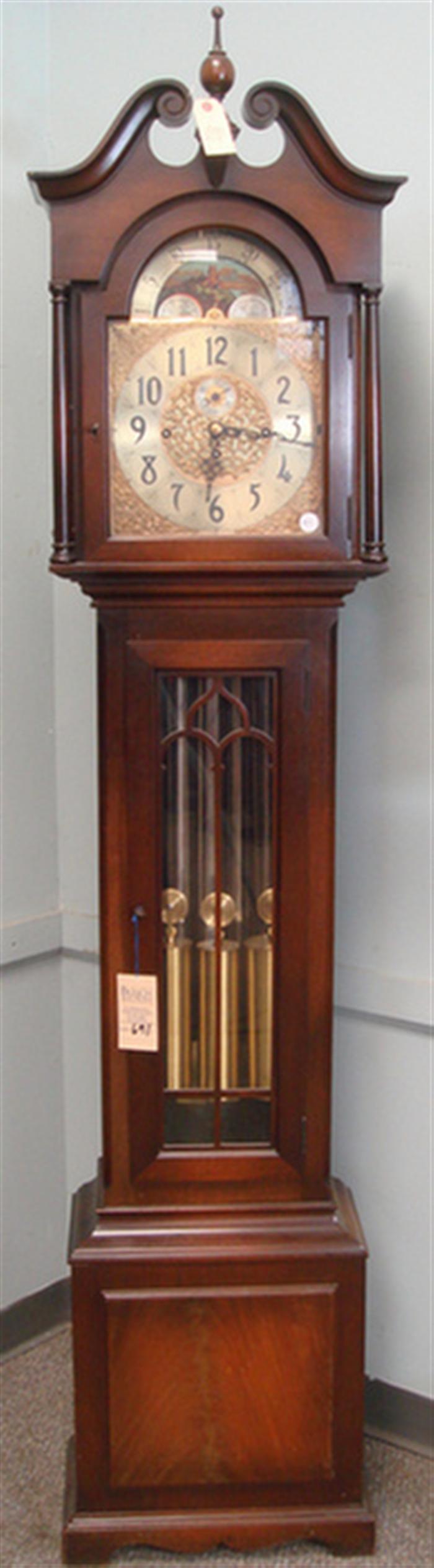 Appraisal: Herschedes tube Westminster chiming weight hall clock broken scroll bonnet