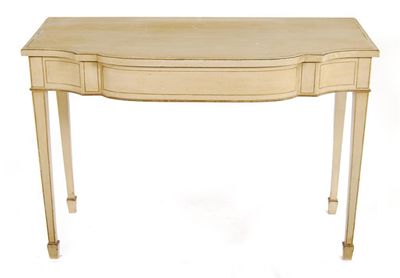 Appraisal: A cream painted side table with gilt highlights the shaped