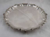 Appraisal: A silver circular waiter the chippendale border with gadroonand shell