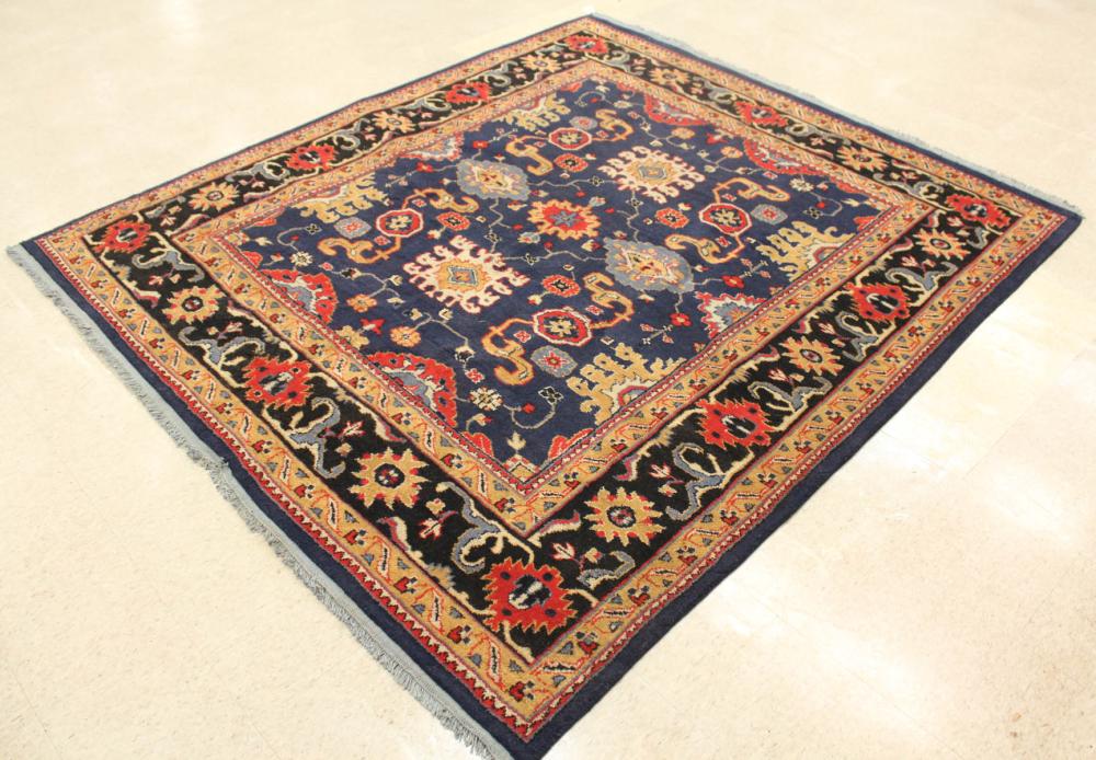 Appraisal: HAND KNOTTED ORIENTAL CARPET Indo-Persian stylized floral arabesque design on