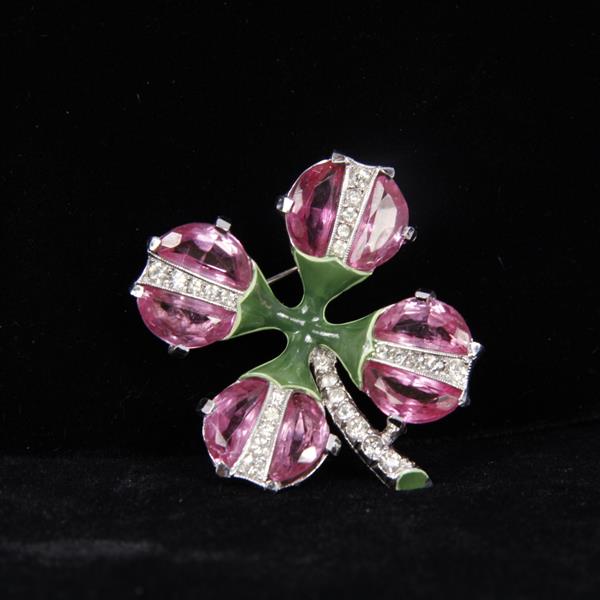 Appraisal: Trifari Enameled and Jeweled Pink Demilune Four Leaf Clover Pin